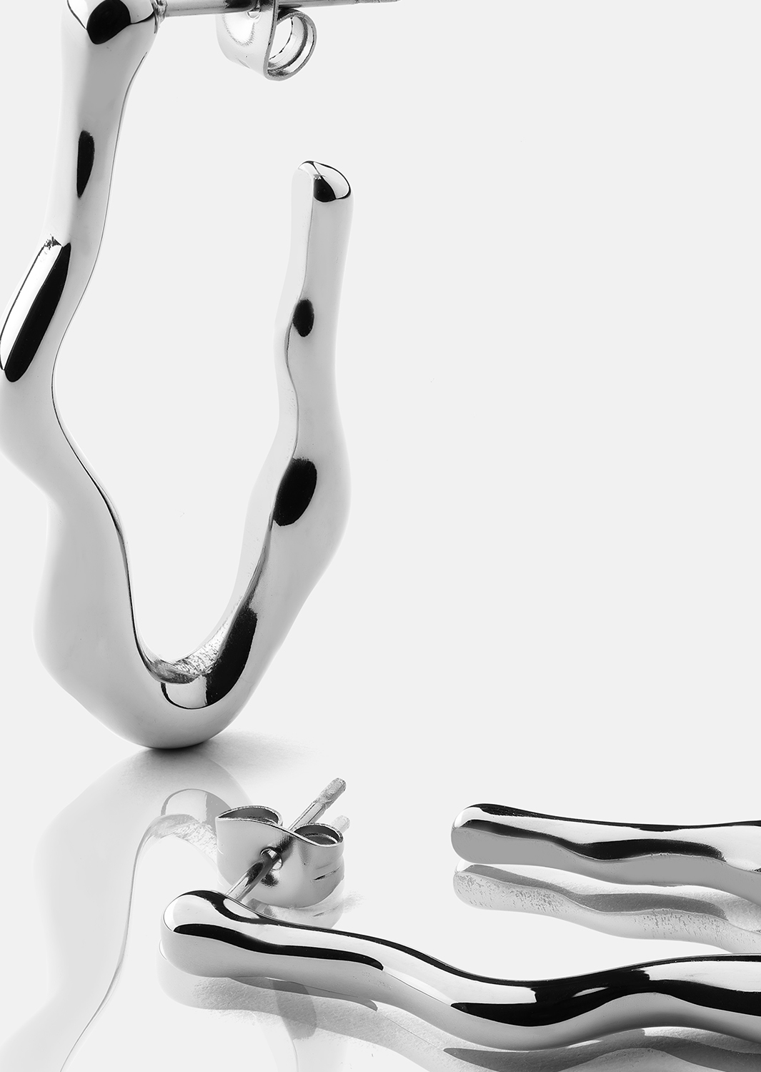 Flow Örhängen – Silverpläterade